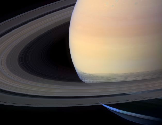 Saturn's aesthetic appeal, only shows half the planet with the rings