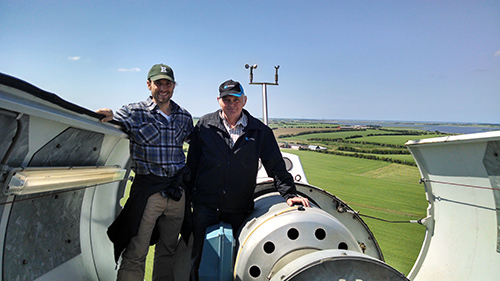 Dan Kasper standing in nacelle of wind turbine in Denmark