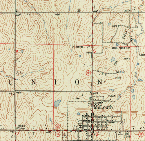 Portion of topographic map showning influence of Public Land Survey on road network in midwest U.S.