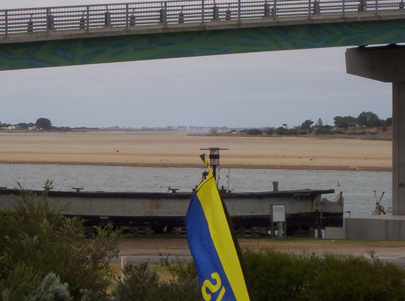 Barge on the riverbank of the drying up Murray River in Australia.