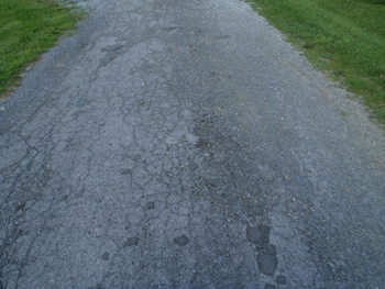 Cracks in blacktop. See description below image